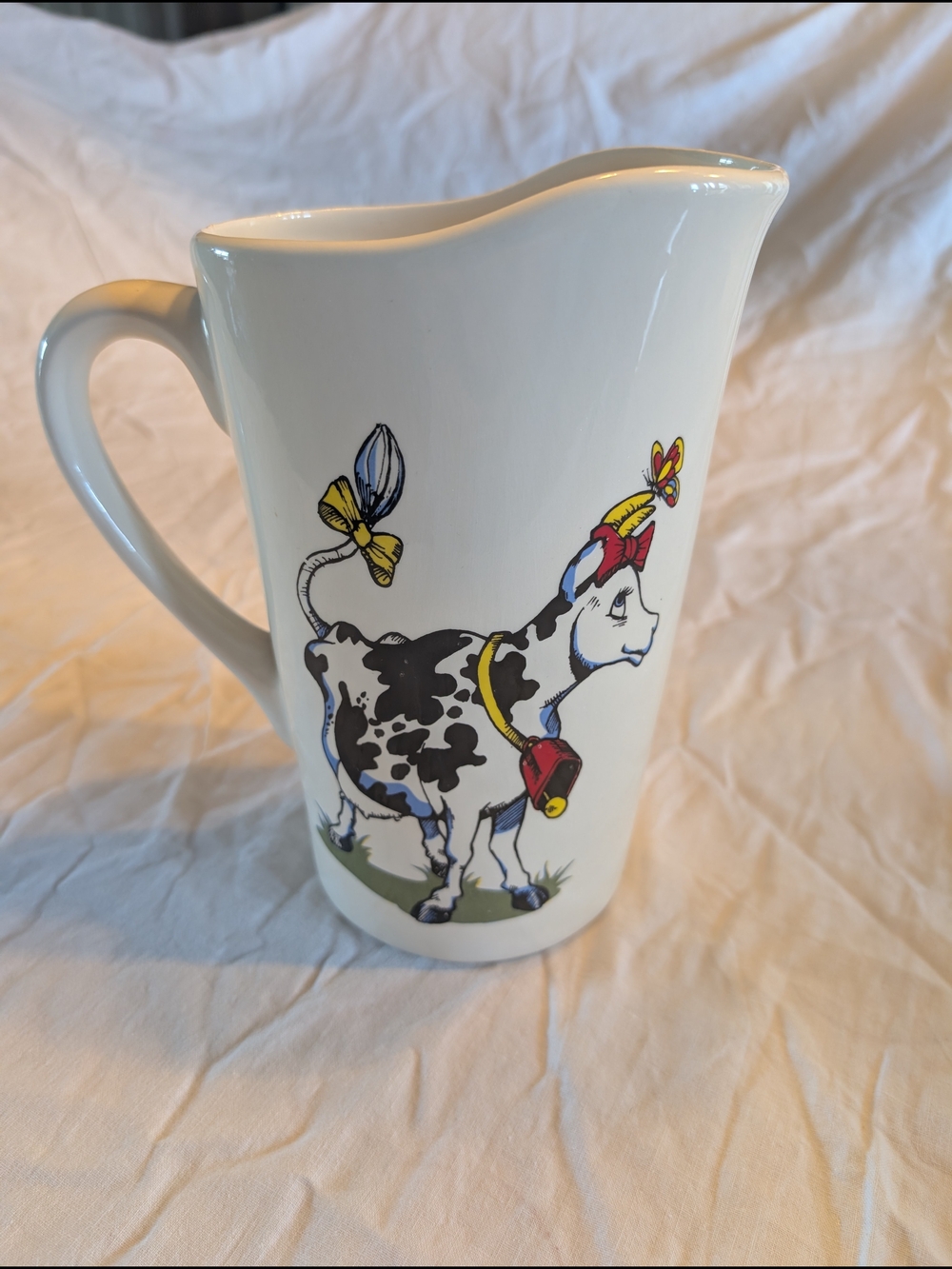 2/40$ Vintage White Ceramic Milk Pitcher with Black, Yellow and Red Cow